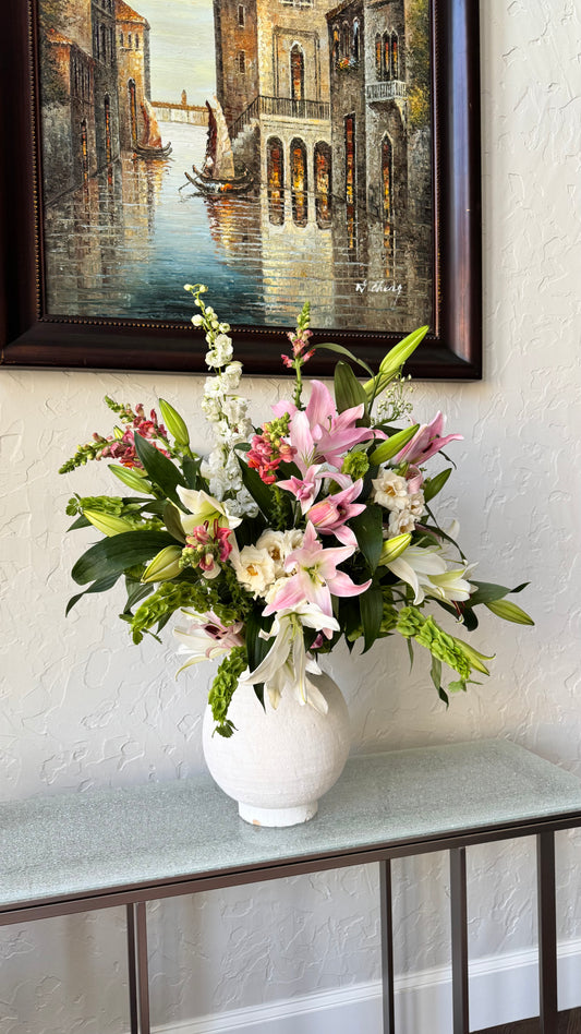 Large Custom Romantic Lilly Floral Arrangement in a Roman Vase