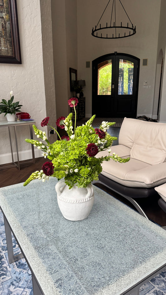 Classic flower bush in a roman vase